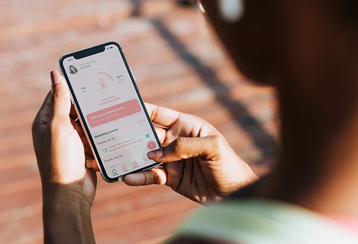 Using the Leeaf patient app on a phone
