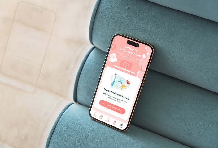 The Leeaf patient app on a phone at home
